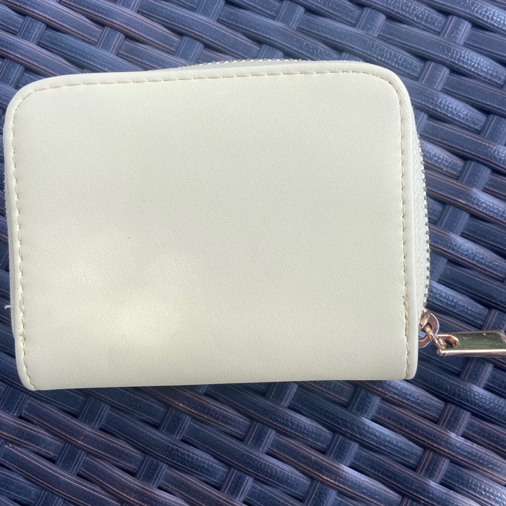 Cute yellow a•n•d eawy wallet.  Never used!  In new condition.